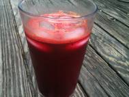 Beet, romaine, orange, carrot, and ginger juice